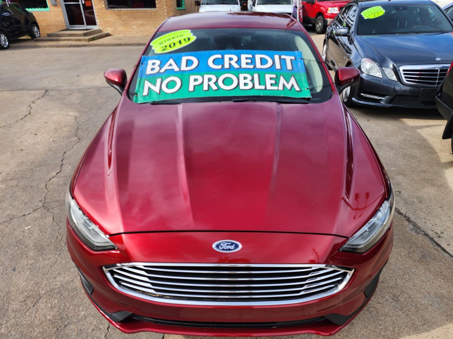 2019 RED Ford Fusion Hybrid SE (3FA6P0LU7KR) , AUTO transmission, located at 2660 S.Garland Avenue, Garland, TX, 75041, (469) 298-3118, 32.885551, -96.655602 - Welcome to DallasAutos4Less, one of the Premier BUY HERE PAY HERE Dealers in the North Dallas Area. We specialize in financing to people with NO CREDIT or BAD CREDIT. We need proof of income, proof of residence, and a ID. Come buy your new car from us today!! This is a 2019 FORD FUSION SE HYBRID - Photo#8